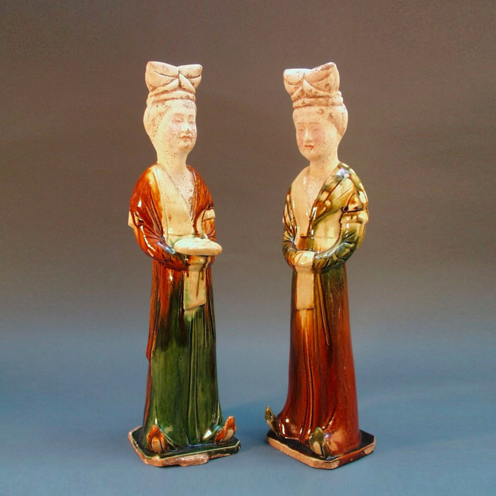 A pair of sancai glazed standing court ladies