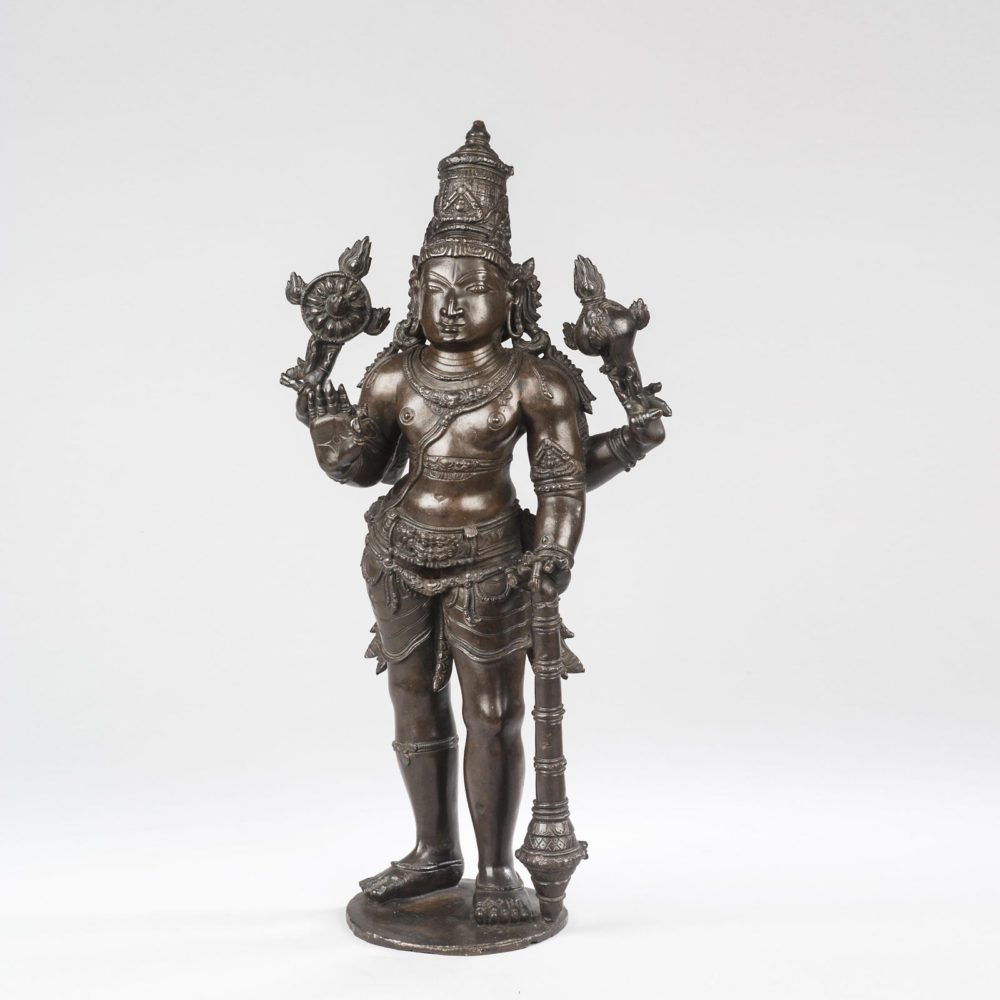A large solid cast bronze figure of Vishnu